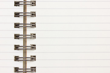 Blank notebook with metallic ring binder.