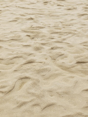 closeup of sand pattern of a beach in the summer