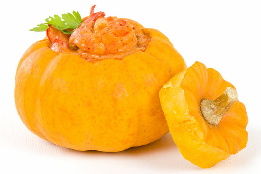 Prawns in Pumpkin (Camarao na Moranga) - Prawns with a creamy coconut milk sauce served inside a roasted pumpkin.
