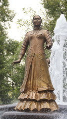 Photo of a statue of dancing woman in national costume at the fountain in Ufa, Bashkortostan