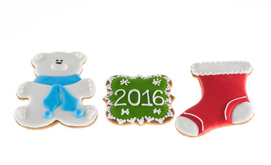 Christmas cookies 2016 with bear and red boot on white background
