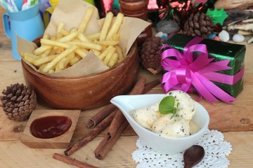 Gift boxes and french fries , ice cream to celebrate Christmas.