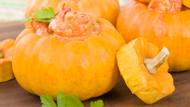 Prawns in Pumpkin (Camarao na Moranga) - Prawns with a creamy coconut milk sauce served inside a roasted pumpkin.
