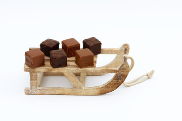 Dominosteine auf Schlitten