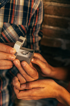 Boygriend Showing His Girlfriend the Engangment Ring