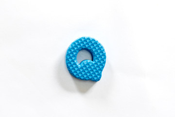 Cute and colorful plastic alphabet letter.