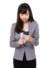 Asian Businesswoman use of the cellphone