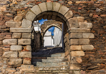 Fototapeta na wymiar Porta do Buraco. One of the four gates of the medieval walls in the historic village of Monsaraz. Alentejo. Portugal. 