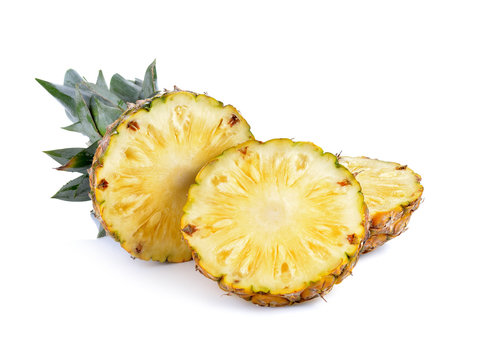 Sliced of ripe pineapple  on white  background