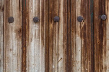 Old planks and iron nails background