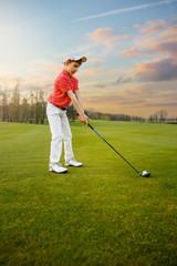 Fototapeta premium Boy playing golf