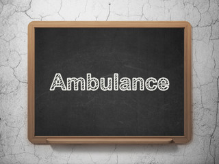 Medicine concept: Ambulance on chalkboard background