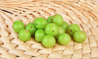 Indian gooseberries on white background