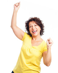 potrait of a mature woman doing a winner gesture