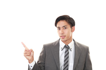 指示する笑顔のビジネスマン