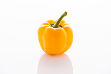 Yellow bell pepper isolated on white