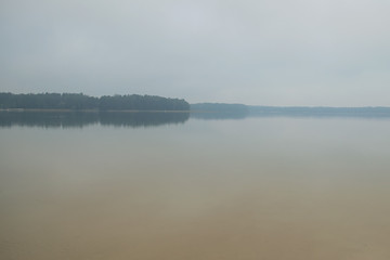 Morning fog on the lake. Autumn (Pisochne ozero, Ukraine)