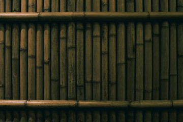 Dark bamboo wood background with space for your data and frame stripe