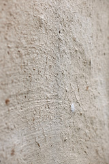Rustic clay wall, perspective. Ethnic background, texture art