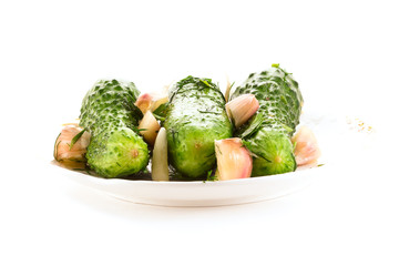 freshly-salted cucumbers isolated on white background