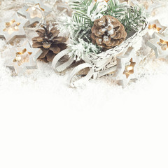Christmas background with decoration with light star, cones and
