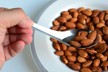 Almond in spoon