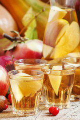 Apple cider in the autumn background, selective focus