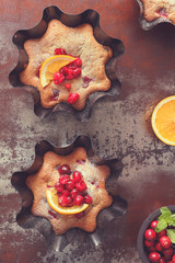Cranberry tarts. Delicious fruit cakes with cranberries and orange