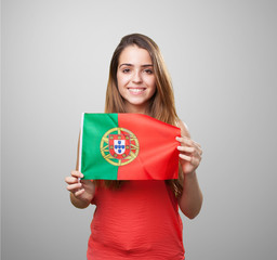 young woman holding a portugal flag on white