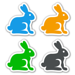Icono plano conejos con sombra en varios colores