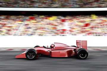 Vue latérale de la voiture de course rouge de sport automobile sur une piste menant le peloton avec le flou de mouvement.