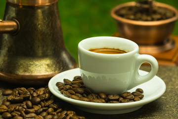 fresh coffee with copper coffee pot and copper-wood coffee grind