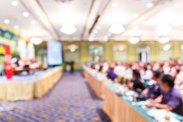 Blurred people in seminar room