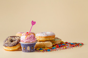 Kid Party decoration. Cupcake with donuts