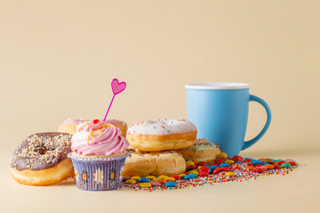 Kid Party decoration. Cupcake with donuts