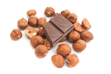 some hazelnuts and chocolate bar