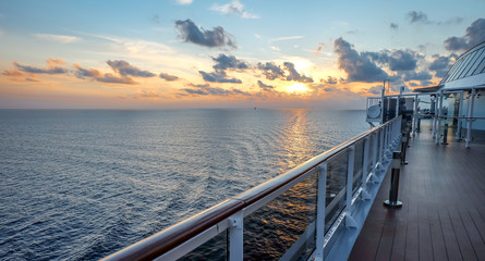 Sunset romantic view from the deck of a boat