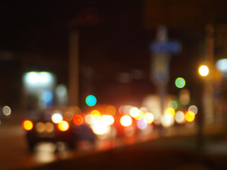 Defocused image of traffic on night city street