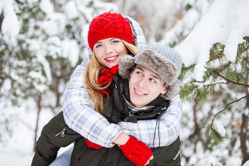 Fototapeta premium Winter beautiful couple. Family Outdoors
