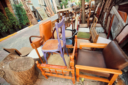 Flea market with wooden chairs