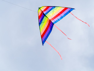 Wind kite flying in a blue sky