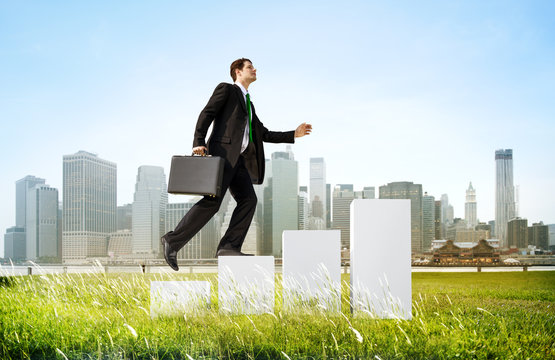 Business Man Climbing Up Steps Outdoors Concept - Powered by Adobe