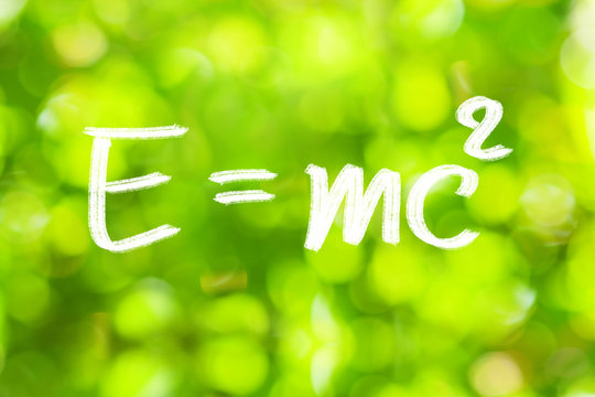E=mc2  on green bokeh  blackboard