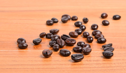 Coffee beans on  wooden background