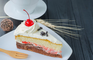 chocolate cake in dish on wooden