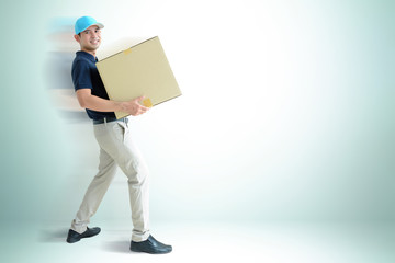 Deliveryman carrying a cardboard box