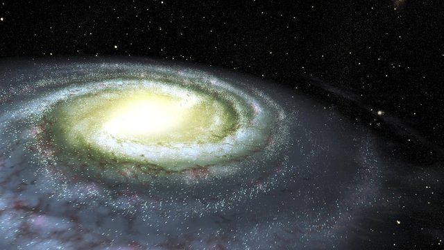 回転する銀河系（天の川銀河）の脇を通り抜ける