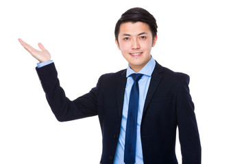 Young Businessman with hand showing blank sign
