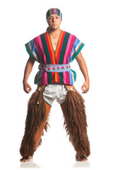 Obraz premium Ecuadorian dancer in traditional highland costume with llama or alpaca pants studio shot isolated on white showcases cultural heritage