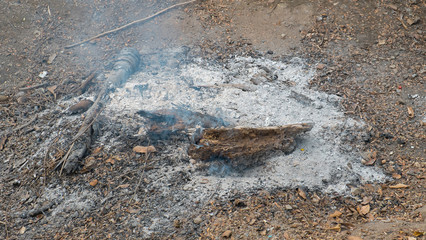 ashes on a burned fire place on ground